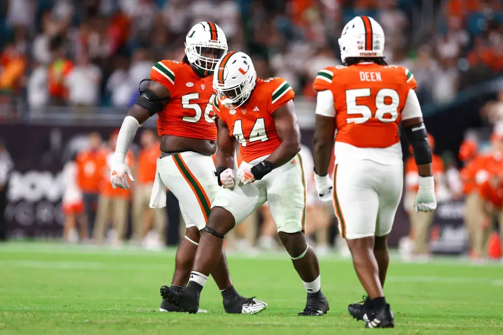 Miami Hurricanes Football Players on Field