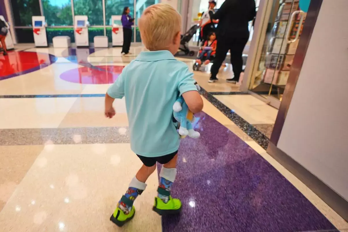 Football Player Secures the Ball