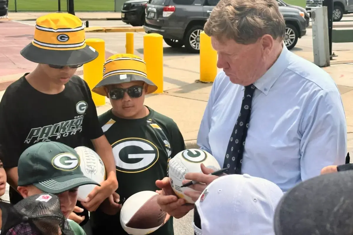 Football Fanatics Meet Coach